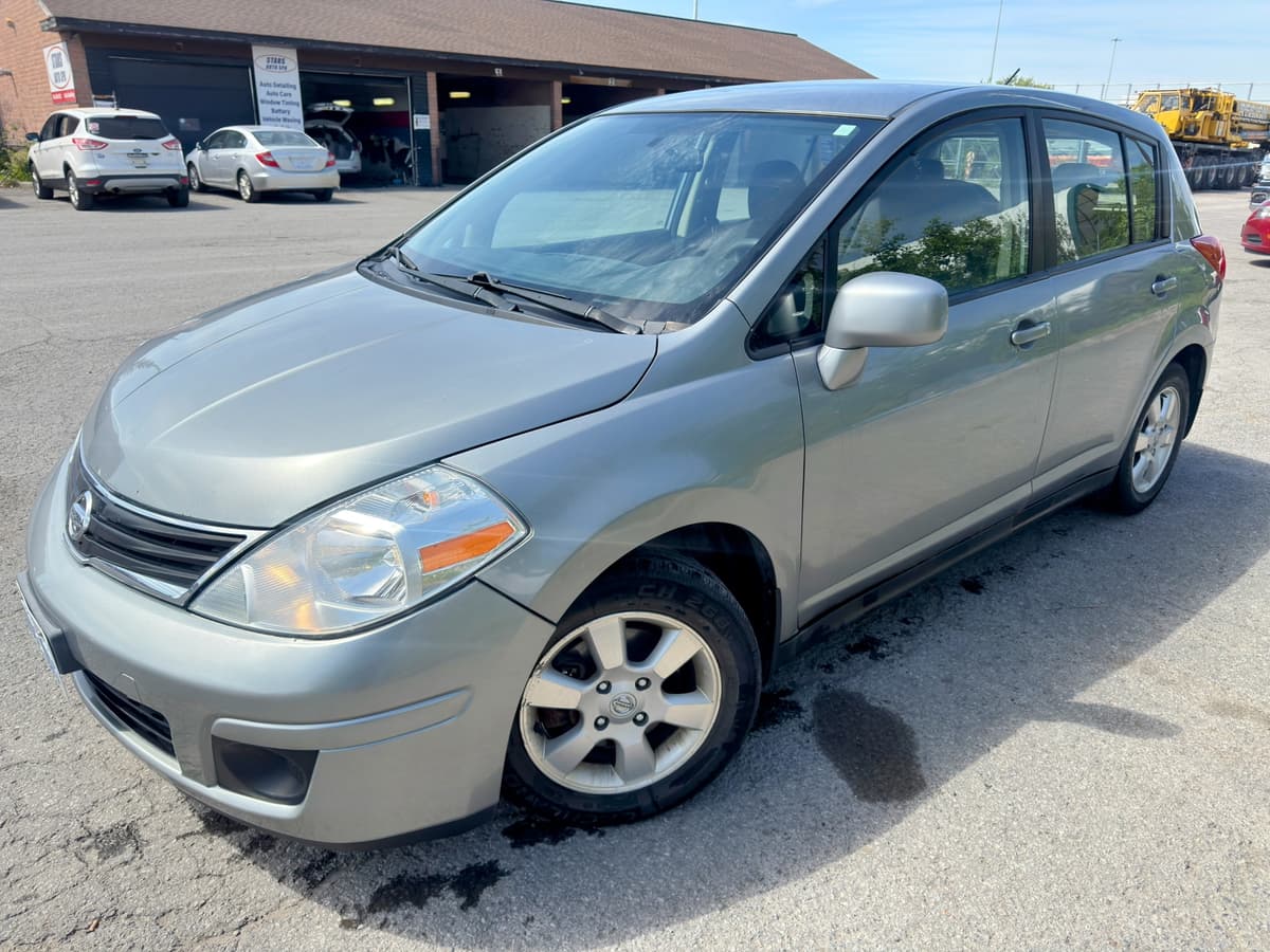 2012 Nissan Versa SL — photo 1