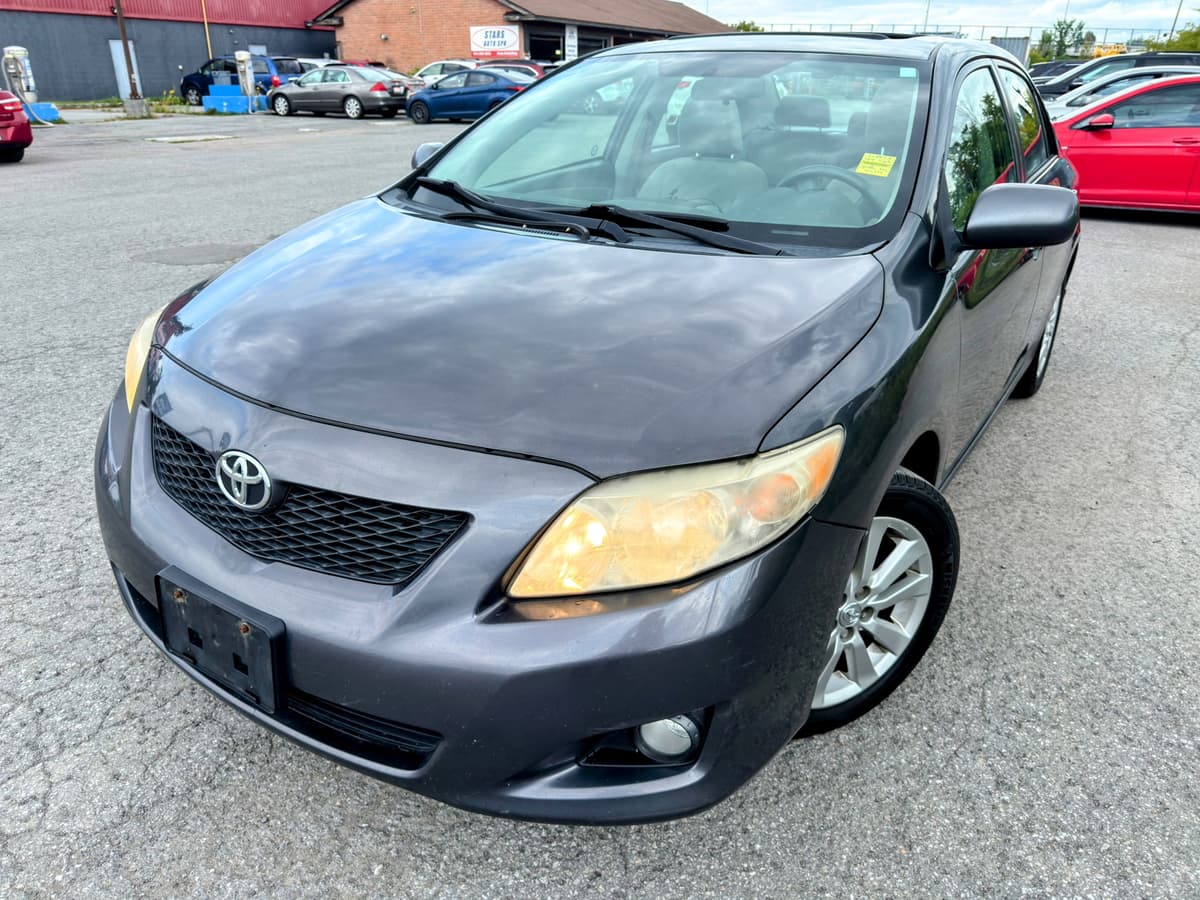 2010 Toyota Corolla LE — photo 1